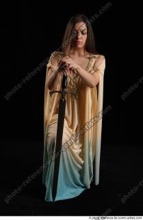 01 2018 01 BARBORA KNEELING POSES WITH SWORD